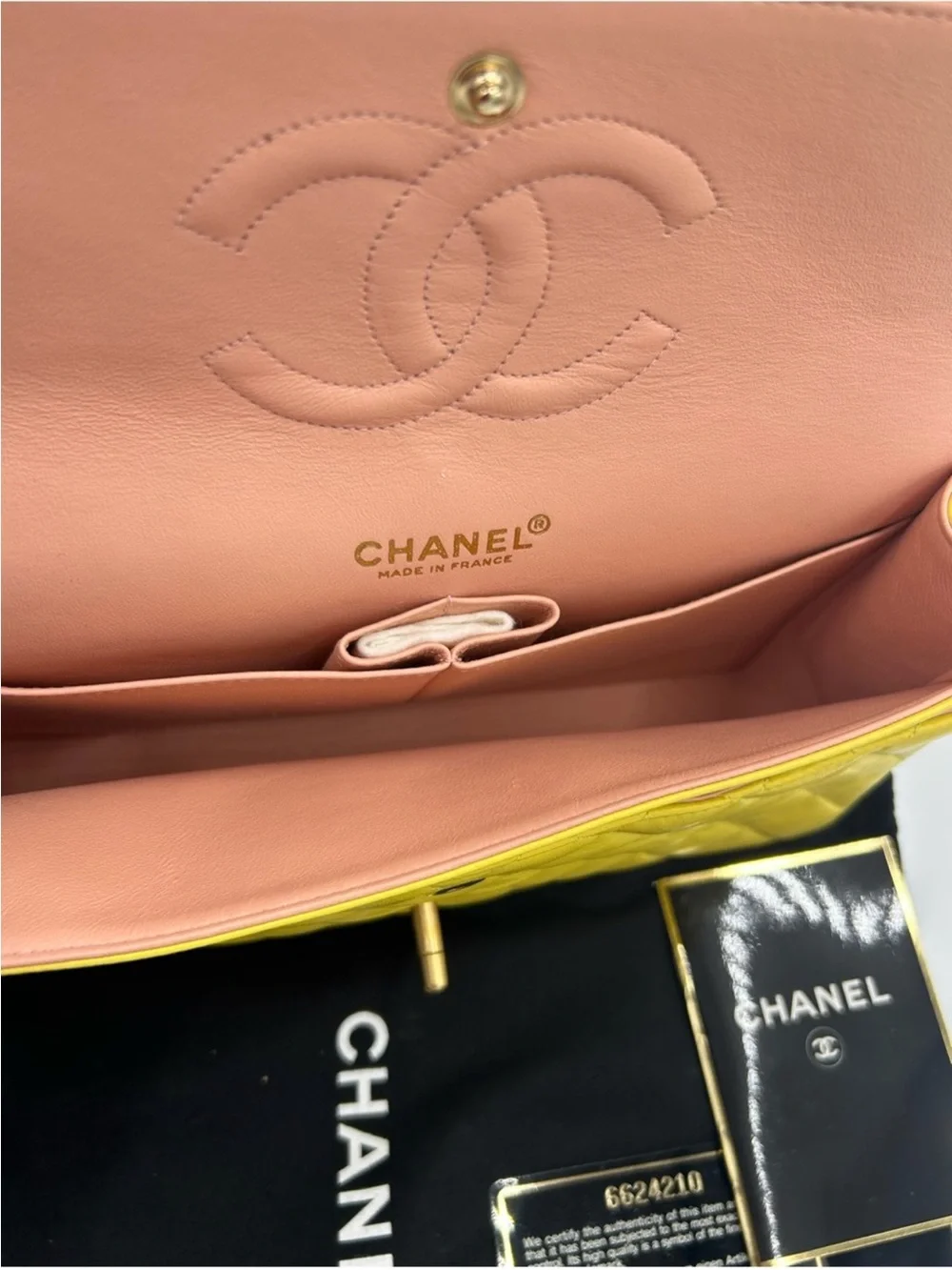 Women’s Chanel, classic quilted double flap bag in yellow with Gould hardware